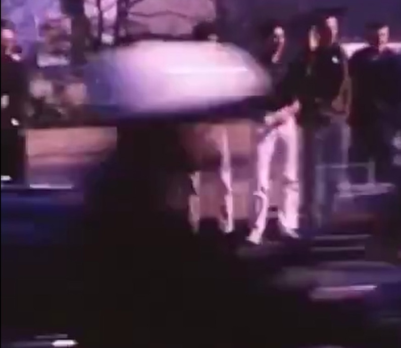 Figure 9. White pants of a spectator impinge upon the motorcycle officer&rsquo;s face. (Source: Keith Griffith, The Sixth Floor Museum)