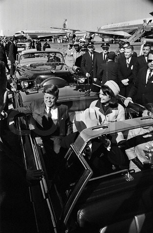 President John F. Kennedy’s Motorcade Passing by the Texas School Book Depository