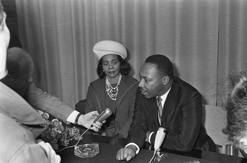 Martin Luther King Sitting with Coretta Scott King Speaking to Members of the Press
