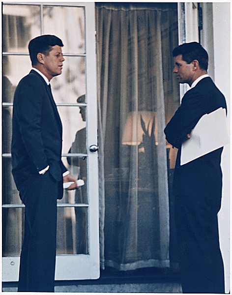 President John F. Kennedy Conversing with Robert F. Kennedy
